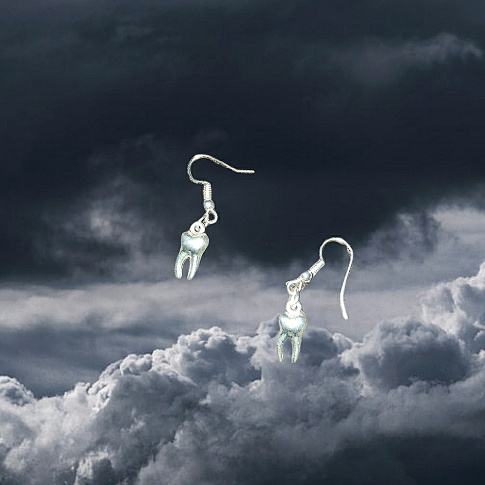 silver teeth earrings
